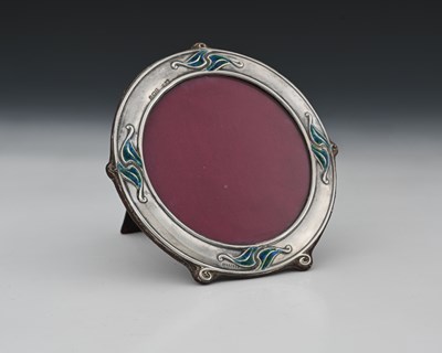 Lot 342 - An Edwardian silver and enamel photograph...