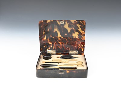 Lot 9 - A George V rectangular tortoiseshell manicure...