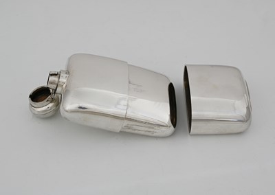 Lot 12 - A late Victorian silver hip flask, of rounded...