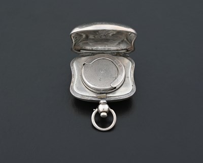 Lot 40 - A George V silver sovereign case, of shaped...