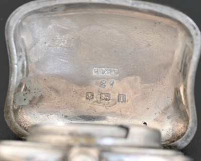 Lot 40 - A George V silver sovereign case, of shaped...