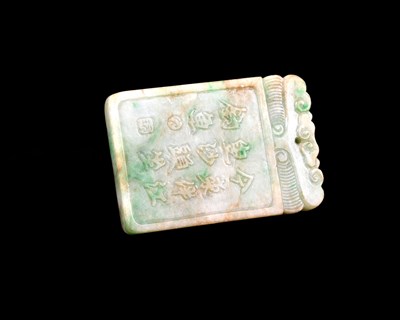 Lot 323 - A Chinese carved jade pendant, rectangular...