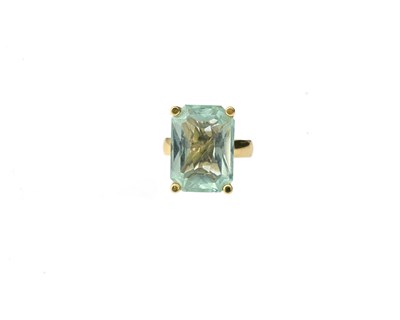 Lot 52 - A yellow metal aquamarine single-stone ring