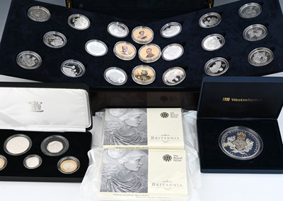 Lot 121 - A large collection of silver proof coins,...