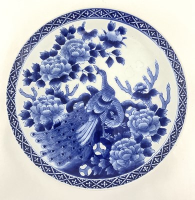 Lot 138 - A Japanese blue and white charger, Meiji...