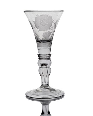 Lot 634 - A Jacobite engraved light baluster wine glass,...