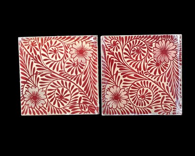 Lot 699 - William De Morgan, a pair of foliate ruby...