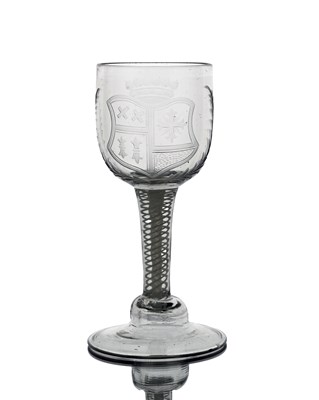 Lot 415 - An opaque twist armorial engraved wine glass,...