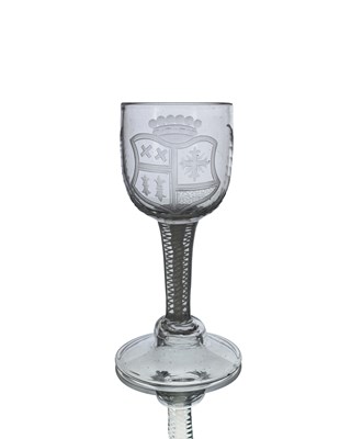 Lot 386 - A Dutch engraved opaque twist armorial wine...