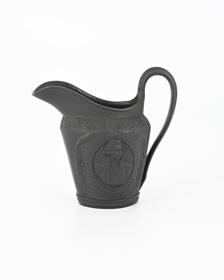 Lot 122 - A Wedgwood black basalt ware jug, circa 1790,...