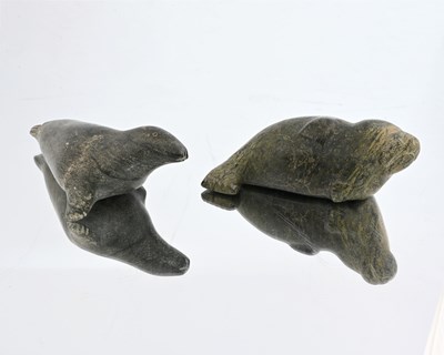 Lot 320 - Two Inuit stone carvings of seals, mid 20th...