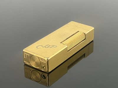 Lot 190 - Alfred Dunhill, gold plated Rollagas lighter,...