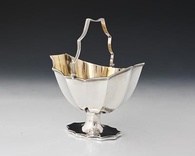 Lot 156 - A George III silver swing handle basket, of...