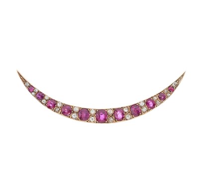 Lot 23 - A late Victorian ruby and diamond crescent brooch