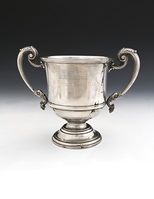 Lot 174 - A George V silver two-handled trophy cup, with...