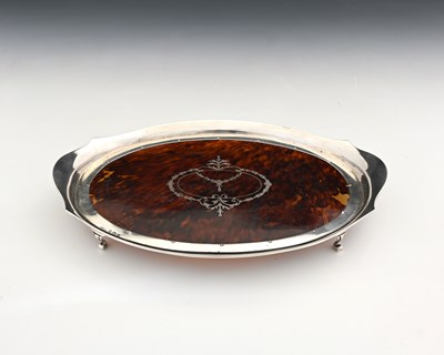 Lot 152 - A George V silver and tortoiseshell dressing...