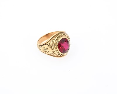 Lot 34 - A 10ct gold red gem college signet ring