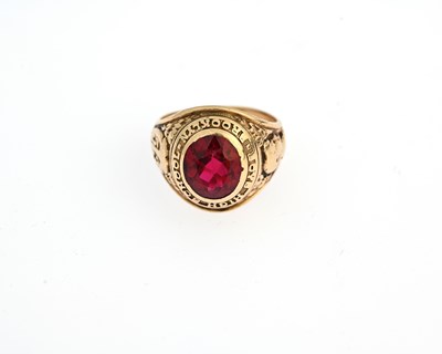 Lot 34 - A 10ct gold red gem college signet ring