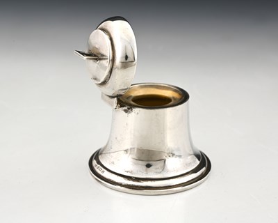 Lot 148 - A George V silver novelty inkwell, modelled in...