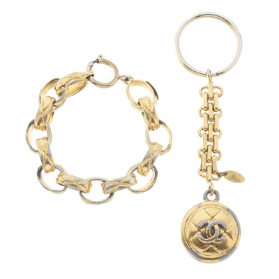 Lot 389 - Chanel, a vintage keyring and bracelet.