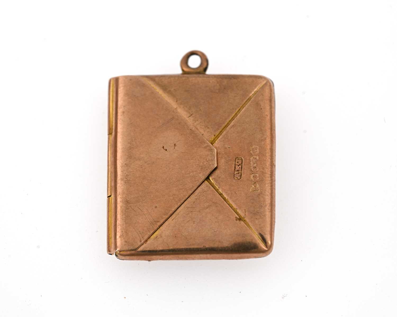 Lot 4 - An early 20th century 9ct gold novelty stamp holder