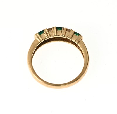 Lot 18 - A 14ct gold emerald and diamond dress ring