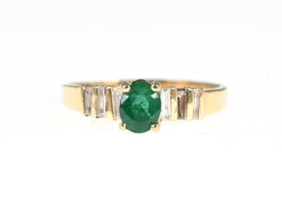 Lot 36 - A 14ct gold emerald and diamond dress ring