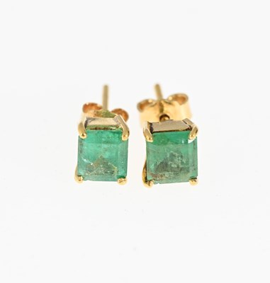 Lot 40 - A pair of gold emerald single-stone stud earrings