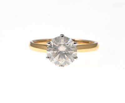 Lot 67 - An 18ct gold diamond single-stone ring