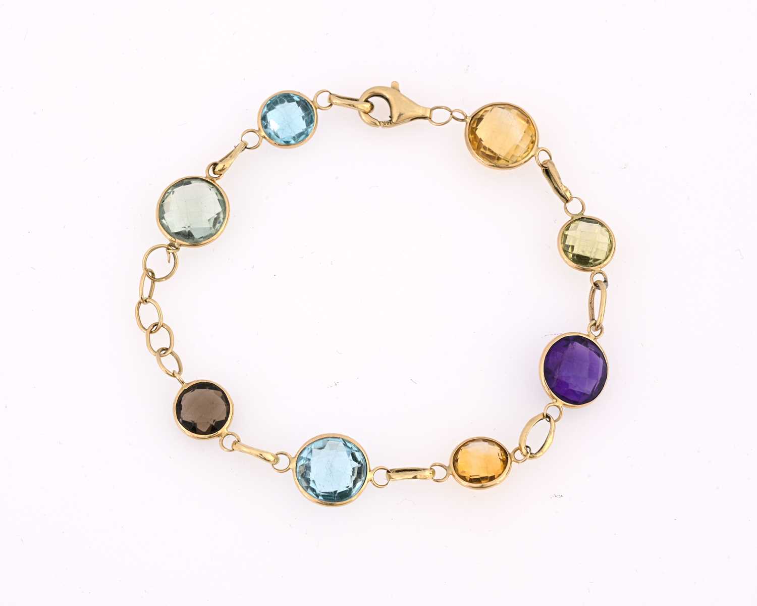 Lot 12 - A 14ct gold multi-gem bracelet