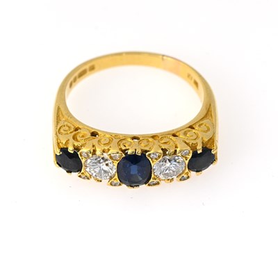 Lot 57 - An 18ct gold sapphire and diamond five-stone ring