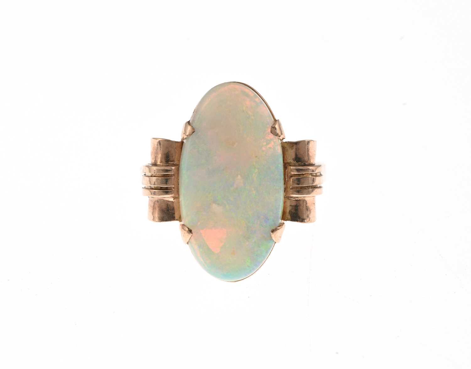 Lot 23 - A 1940s gold opal single-stone dress ring