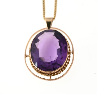 Lot 46 - An early 20th century 9ct gold amethyst pendant, with chain