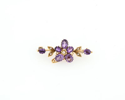 Lot 45 - An early 20th century 18ct gold amethyst and pearl floral bar brooch