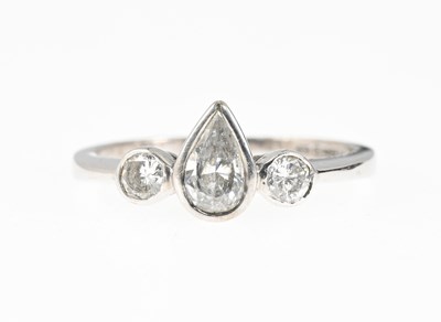 Lot 58 - An 18ct gold diamond three-stone ring