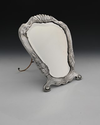 Lot 235 - Osiris, a Jugendstil pewter easel back mirror,...