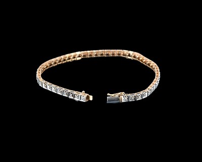 Lot 19 - A 9ct gold diamond line bracelet