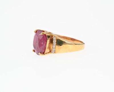 Lot 43 - An 18ct gold ruby and diamond dress ring