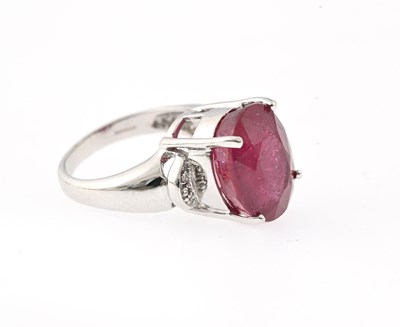 Lot 55 - An 18ct gold ruby and diamond dress ring