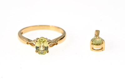 Lot 15 - An 18ct gold chrysoberyl single-stone ring and a pendant