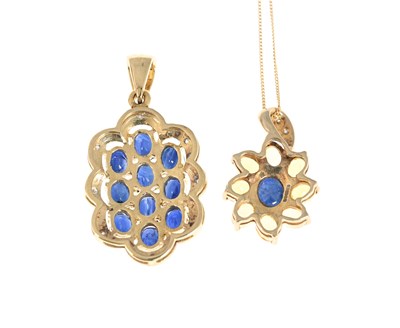 Lot 31 - Two 9ct gold sapphire and diamond pendants, one with chain