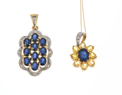 Lot 31 - Two 9ct gold sapphire and diamond pendants, one with chain