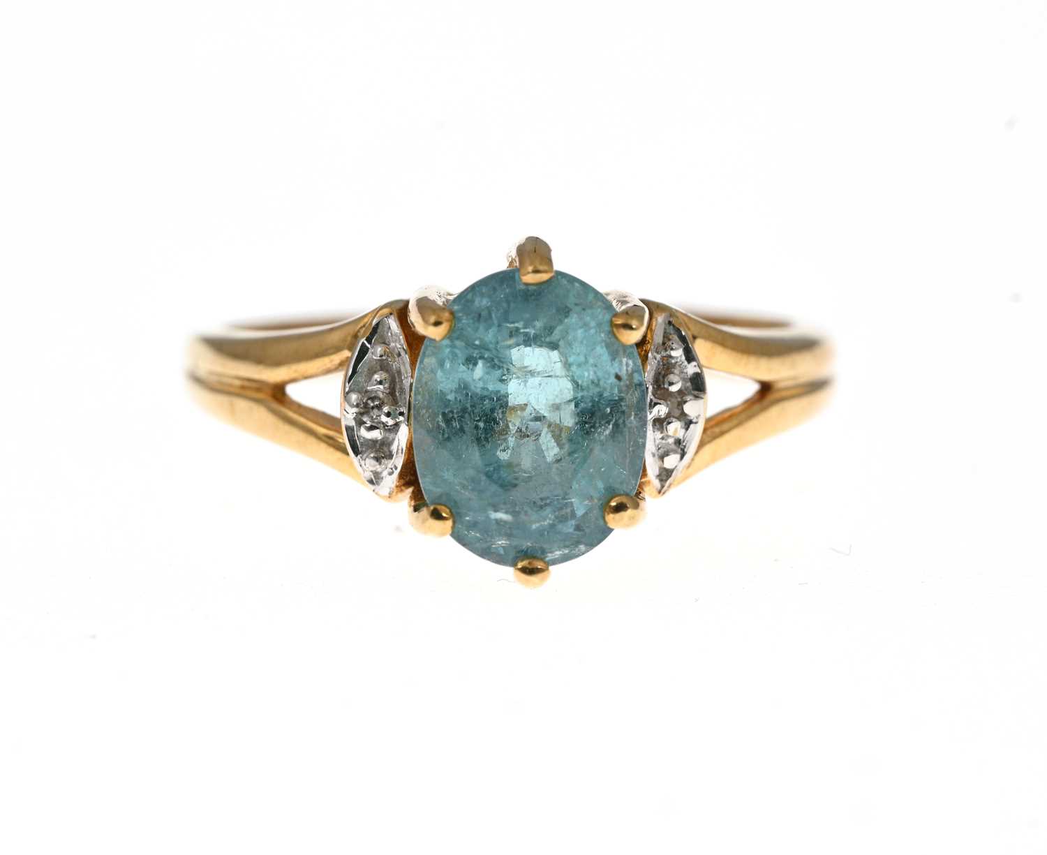 Lot 14 - An 18ct gold blue tourmaline and diamond dress ring