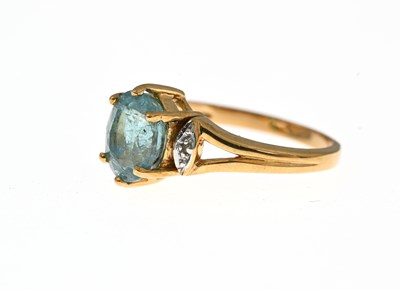 Lot 14 - An 18ct gold blue tourmaline and diamond dress ring