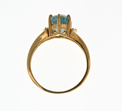 Lot 14 - An 18ct gold blue tourmaline and diamond dress ring