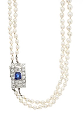 Lot 149 - A cultured pearl two-row necklace, with Art Deco sapphire and diamond clasp