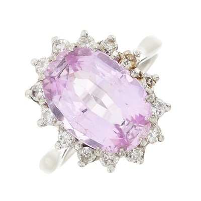 Lot 62 - An 18ct gold pink topaz and diamond cluster ring