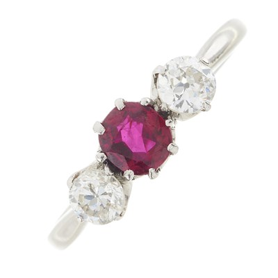 Lot 225 - A mid 20th century 9ct gold ruby and diamond three-stone ring