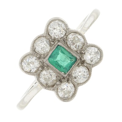 Lot 155 - A mid 20th century emerald and diamond cluster ring