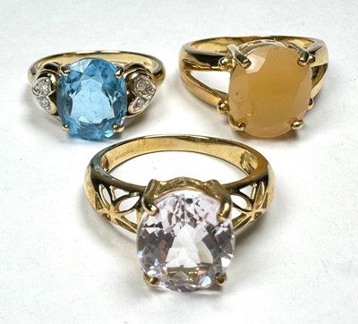 Lot 299 - Three gold coloured gem-set rings